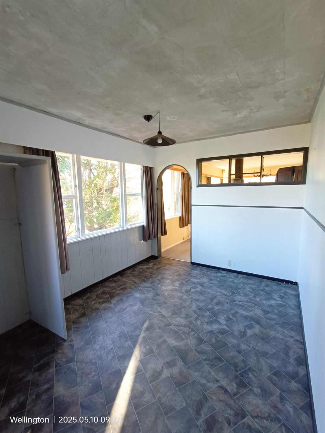 Lounge and dining area before the wall was removed